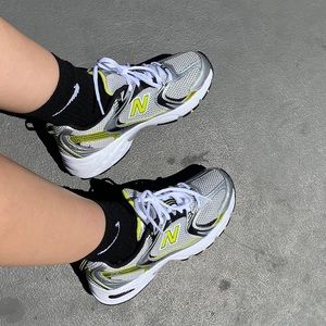 New Balance 530 Retro silver grey yellow sneakers Sz 5.5 men’s 7 women’s